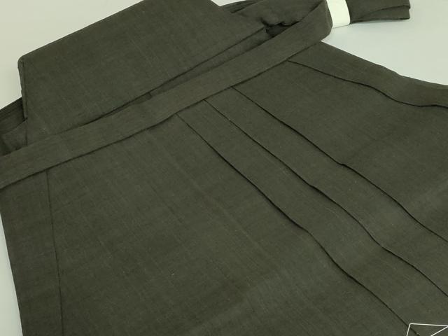 平和屋本店●希少 男性 本場結城紬 重要無形文化財 地機 行灯袴 黒緑色地 小倉商店 証紙付き 伊勢丹扱い 逸品 未使用 DZAB3189kh6