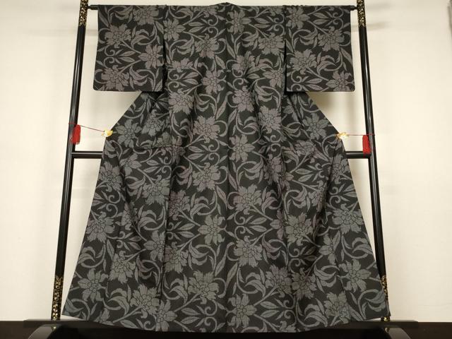 平和屋着物▽本場大島紬 単衣 7マルキ 花唐草文 黒地 正絹 逸品 未使用 AAAS3093iu