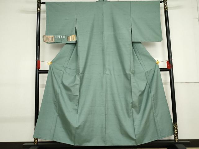 平和屋着物●石川県指定無形文化財 牛首紬 白山工房 手織り 本加賀友禅作家 岡本幸治 色無地 薄青色 証紙付き 正絹 逸品 未使用 AABF9052cs