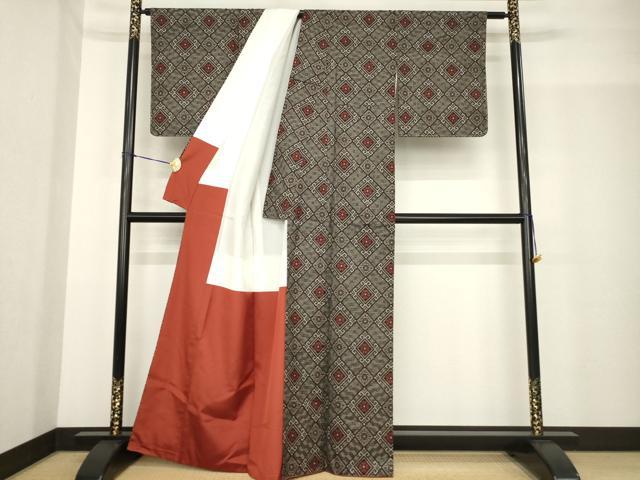 平和屋着物●本場大島紬 龍郷絣 花菱文 手織り 久根美代作 証紙付き 正絹 逸品 AABF9651ck