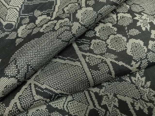 平和屋着物●本場大島紬 カタス9マルキ 草花文 黒地 正絹 逸品 未使用 AABG4787fy