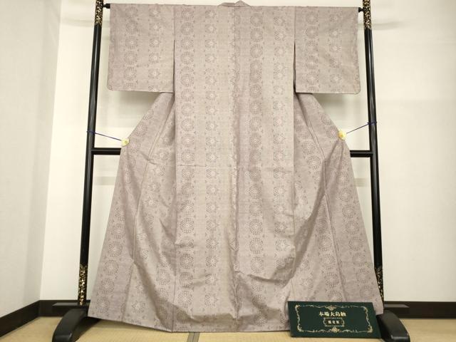 平和屋着物●都喜ヱ門 本場大島紬 カタス9マルキ 華紋の煌き 大久保ヤエ子作 証紙付き 藤絹織物謹製 正絹 逸品 未使用 AABG6937ck