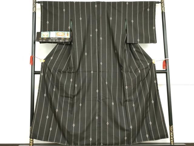 平和屋着物●本場大島紬 泥染 一元絣 総絣 花間道 黒地 証紙付き 関絹織物謹製 正絹 逸品 未使用 AABH3608cs