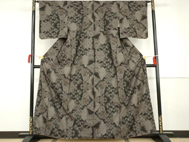 平和屋着物●本場大島紬 泥染め カタス7マルキ 切嵌吉祥更紗花文 正絹 逸品 未使用 AABH3686cs