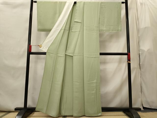 平和屋着物▽京都の和装業の老舗一門 千切屋 色無地 単衣 寿光織 紋意匠 染柳色 反端付き 正絹 逸品 未使用 AABI0155st