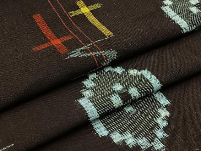 平和屋着物●久留米絣 単衣 琉球絣文様 黒鳶色 綿 逸品 未使用 BAAW2205yc