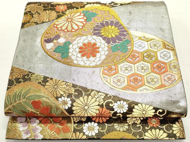 平和屋着物○六通柄袋帯 唐織 作家物 錦雅四季花文