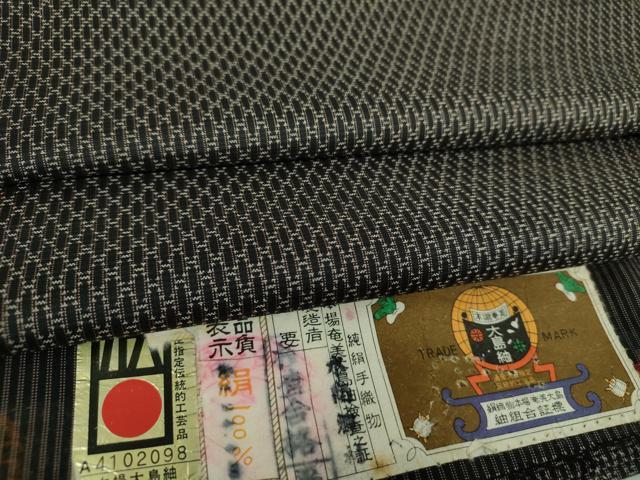 平和屋着物○男性 本場大島紬 菱文 証紙付き 正絹 逸品 DABA1471ps