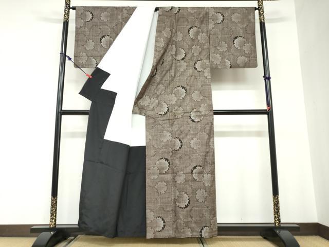 平和屋着物●本場大島紬 古代染色純泥染 7マルキ 雪輪文 証紙付き 川畑春廣作 正絹 逸品 DABC2681ud
