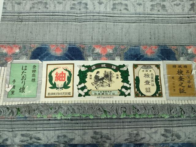 平和屋着物●全通柄袋帯 結城紬 奥順 はたおり娘 手緒里 横段花文 証紙付き 正絹 逸品 未使用 DABD1900ps