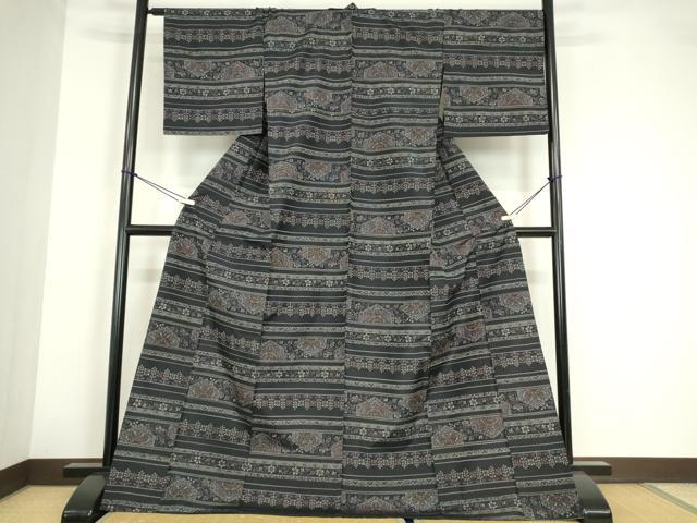 平和屋着物▽上質な紬 単衣 横段花文 黒地 正絹 逸品 DABE4215az