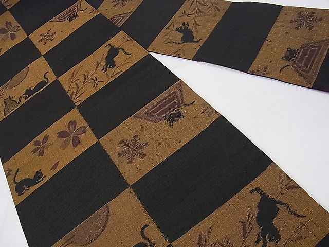 平和屋本店■極上 全通柄九寸名古屋帯 猫 春夏秋冬 桜 蜻蛉 芒 炬燵 黒地 逸品 未使用 DZAA0320kh4 - 平和屋