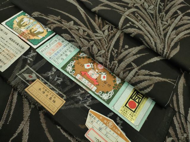 平和屋本店■極上 本場大島紬 恵大島織物 二代目・恵美知雄謹製 9マルキ 古代染色純泥染 蘭花 証紙付き 逸品 未使用 DZAB1160kh5
