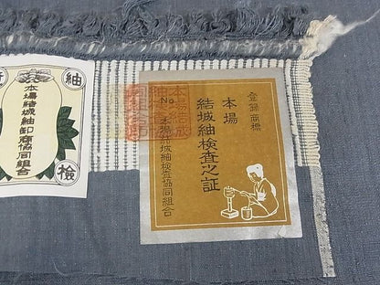 平和屋本店●極上 本場結城紬 重要無形文化財 奥順 色無地 鉄御納戸色 証紙付き 着丈159cm 裄丈66cm 正絹 逸品 未使用 4kk4040