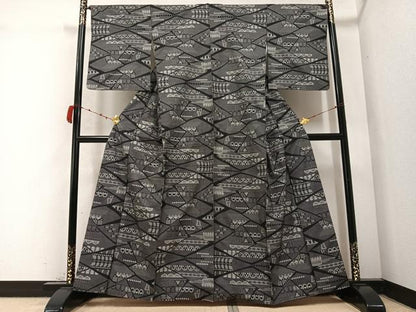 平和屋着物●本場大島紬 一元総絣 幾何学文様 正絹 逸品 AABC2551ph