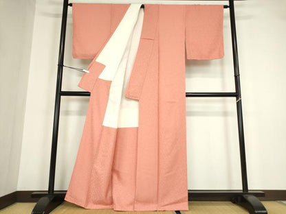 平和屋着物●上質な色無地　吉祥花地紋　甚三紅色　正絹　逸品　未使用　DABA4103az