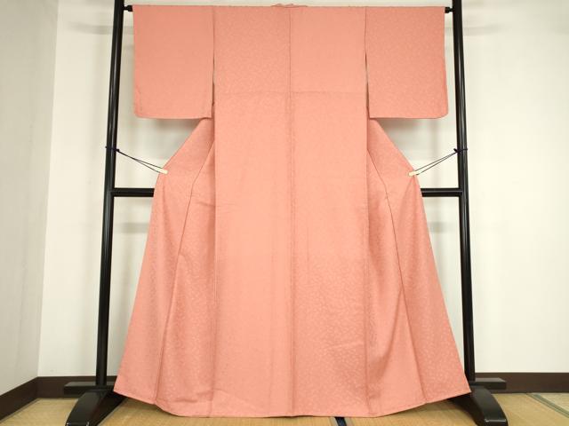 平和屋着物○上質な色無地 吉祥花地紋 甚三紅色 正絹 逸品