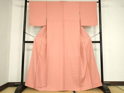 平和屋着物●上質な色無地　吉祥花地紋　甚三紅色　正絹　逸品　未使用　DABA4103az