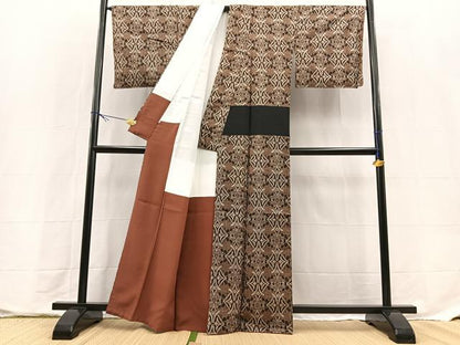 平和屋着物■本場大島紬　幾何学花文　鈴乃屋扱い　正絹　逸品　BAAX9638yc
