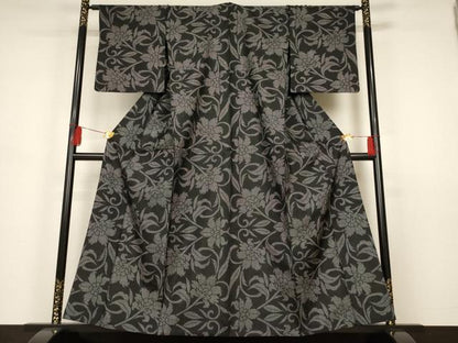 平和屋着物▽本場大島紬 単衣 7マルキ 花唐草文 黒地 正絹 逸品 未使用 AAAS3093iu