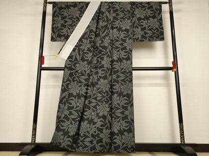 平和屋着物▽本場大島紬 単衣 7マルキ 花唐草文 黒地 正絹 逸品 未使用 AAAS3093iu