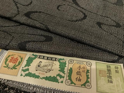 平和屋着物●錦麗手織紬 100亀甲 よろけ縞 黒地 証紙付き 正絹 逸品 AAAT0612zg