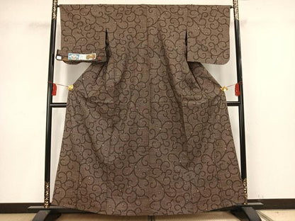平和屋着物▽本場大島紬 単衣 7マルキ 古代染色純泥染め 手織り 唐草文 証紙付き 正絹 逸品 AAAV8372fy