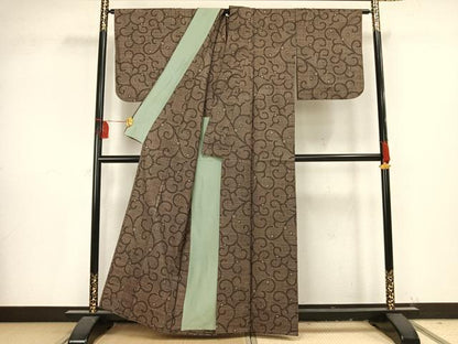 平和屋着物▽本場大島紬 単衣 7マルキ 古代染色純泥染め 手織り 唐草文 証紙付き 正絹 逸品 AAAV8372fy