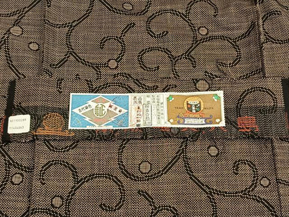 平和屋着物▽本場大島紬 単衣 7マルキ 古代染色純泥染め 手織り 唐草文 証紙付き 正絹 逸品 AAAV8372fy