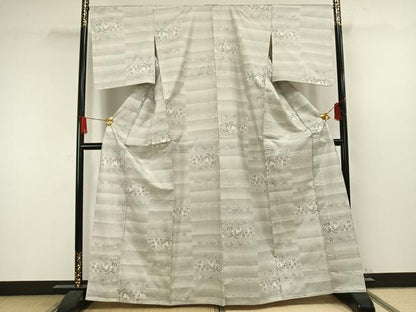 平和屋着物▽本場大島紬 単衣 白大島 9マルキ 横段花蝶文 正絹 逸品 AAAW1369fy
