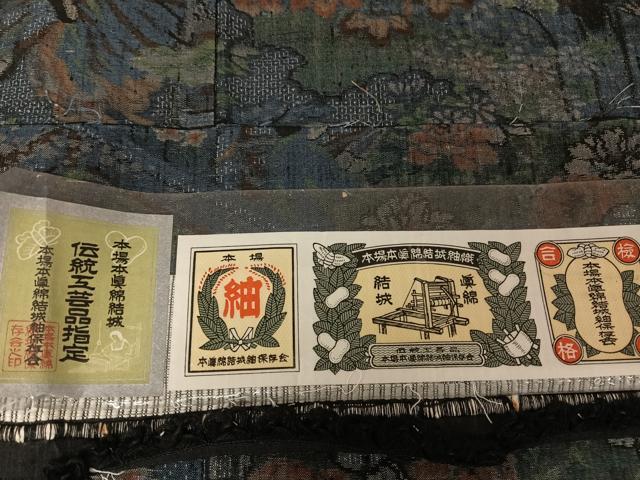 平和屋着物●本場本真綿結城紬 100亀甲 人物風景花文 やまと誂製 証紙付き 正絹 逸品 未使用 AAAW4081np