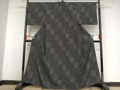 平和屋着物●本塩沢 110亀甲 変わり市松文 黒地 正絹 逸品 未使用 AAAW4258np