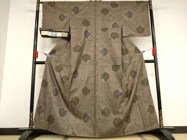 平和屋着物●本場大島紬 古代染色 純泥染 手織 一元7マルキ 雪輪重ね文 福山アイ子作 証紙付き 正絹 逸品 未使用 AAAW5302br
