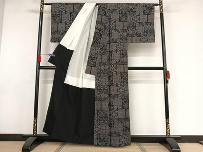 平和屋着物●本場大島紬 一元絣 更紗花文 黒地 正絹 逸品 AAAY1521np