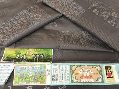 平和屋着物▽入来玄彩 本場大島紬 単衣 竹炭染 横段花文 カネトク謹製 証紙付き 正絹 逸品 AAAY1752np