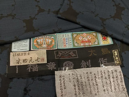 平和屋着物●本場大島紬　古代泥染め　カタス7マルキ　雪輪　福章　伝統工芸士・米田元七作　証紙付き　正絹　逸品　未使用　AAAY8992ph