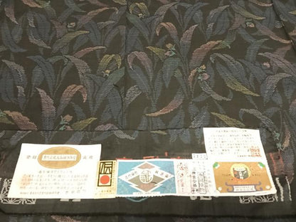 平和屋着物●本場大島紬　純泥染め　手織り　カタス7マルキ　草花文　恵絹織物謹製　証紙付き　正絹　逸品　AAAZ7332zg