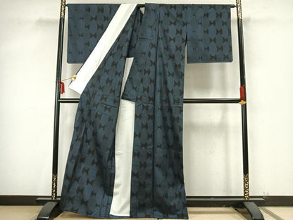 平和屋着物▽本場大島紬 単衣 7マルキ 幾何学文 正絹 逸品 未使用 AAAZ9501fy