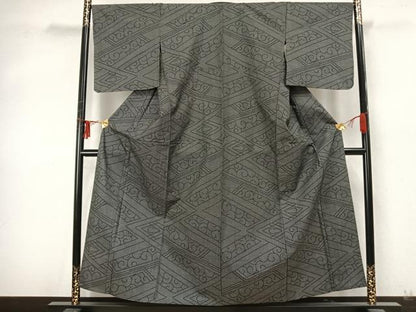 平和屋着物▽本場大島紬 単衣 7マルキ 唐草文 正絹 逸品 未使用 AABA7476fy