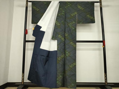 平和屋着物●本場大島紬 一元7マルキ 幾何学花菱文 正絹 逸品 AABB7344ck