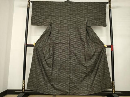 平和屋着物●本場大島紬 一元7マルキ 花菱文 黒地 正絹 逸品 AABC9464ck