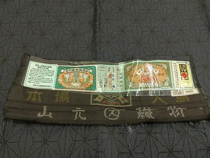 平和屋着物▽本場大島紬 単衣 泥染め 麻の葉文様 やまと誂製 山元健作 証紙付き 正絹 逸品 AABD0438fy