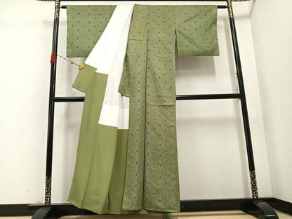 平和屋着物●上質な小紋 紬地 型染め 舞花文 油色地 正絹 逸品 AABD0805ph