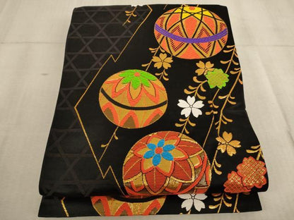 平和屋着物∵子供　全通柄袋帯　唐織　枝垂れ桜手毬文　黒地　金糸　逸品　未使用　AABE2177ja