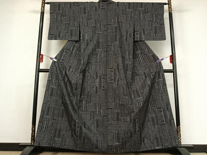 平和屋着物▽本場大島紬 単衣 7マルキ 幾何学文様 黒地 正絹 逸品 AABE3376jh