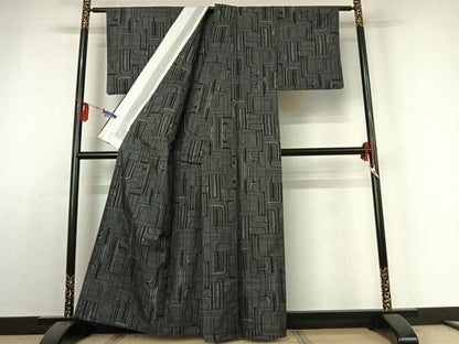 平和屋着物▽本場大島紬 単衣 7マルキ 幾何学文様 黒地 正絹 逸品 AABE3376jh