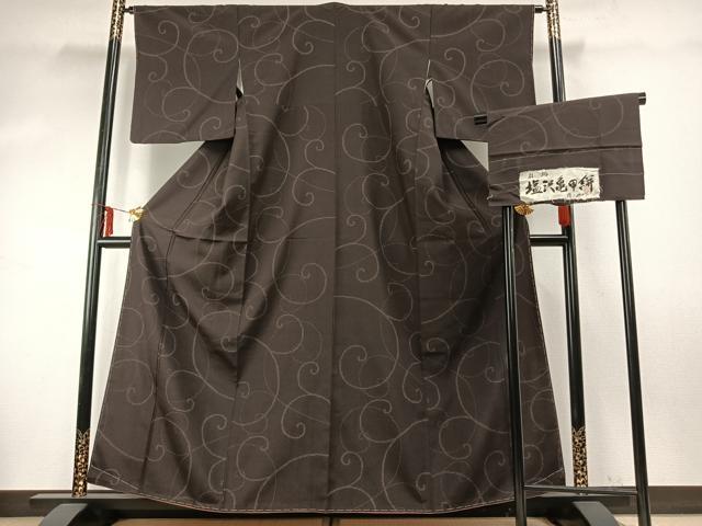 平和屋着物○お召 塩沢亀甲絣 110亀甲 唐草文 反端付き 正絹