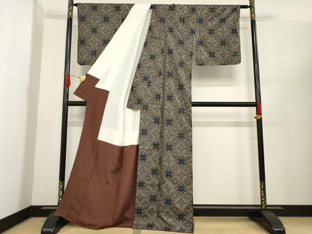 平和屋着物○本場大島紬 龍郷絣 花菱文 正絹 逸品 AABE8208ck