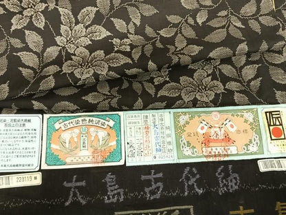 平和屋着物●本場大島紬 カタス9マルキ 泥染め 枝花文 大島古代紬謹製 証紙付き 正絹 逸品 未使用 AABF0272fy