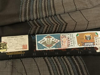 平和屋着物●本場大島紬 カタス7マルキ 泥染め 手織 幾何学文様 深田兼徳作 証紙付き 正絹 逸品 AABF0647fy